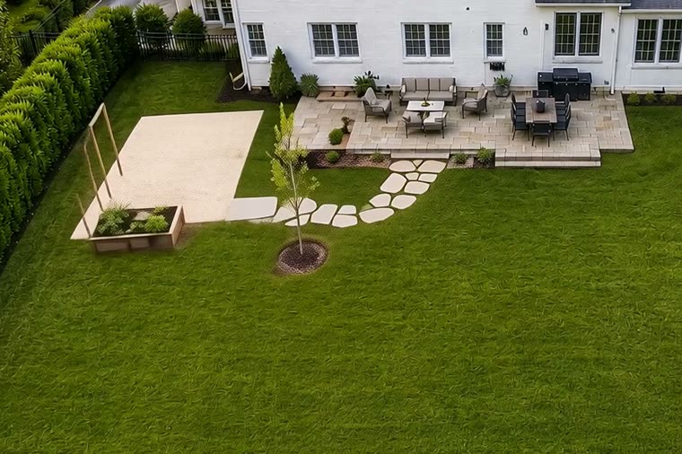 The garden footprint marked out on the lawn